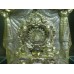 Mother and child relic with solar symbol